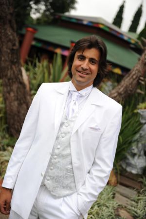 White suit with silver accessories